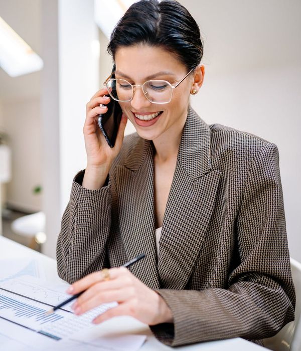 Confident female business professional in modern office